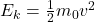 E_k = \frac{1}{2} m_0 v^2